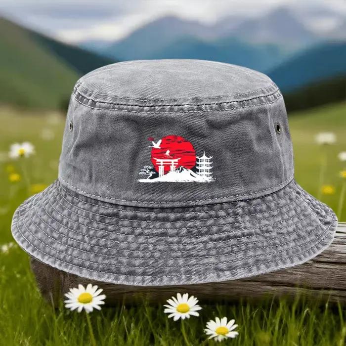 Un chapeau bob décontracté pour les sports de plein air, avec un motif de paysage japonais. Cette ca