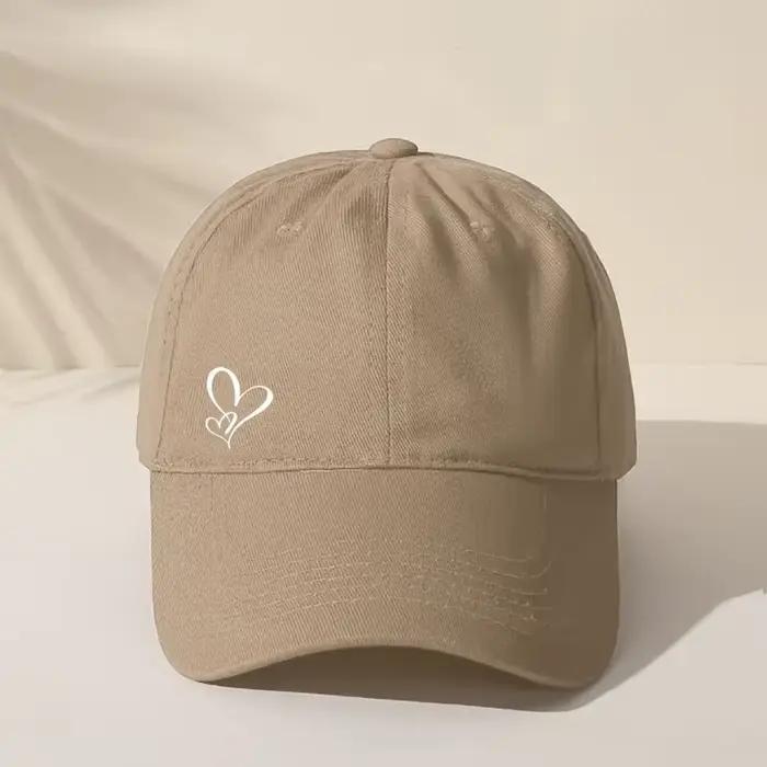 Casquette de baseball à motif de coeur mignon avec un design de coeur blanc, décontractée et réglabl