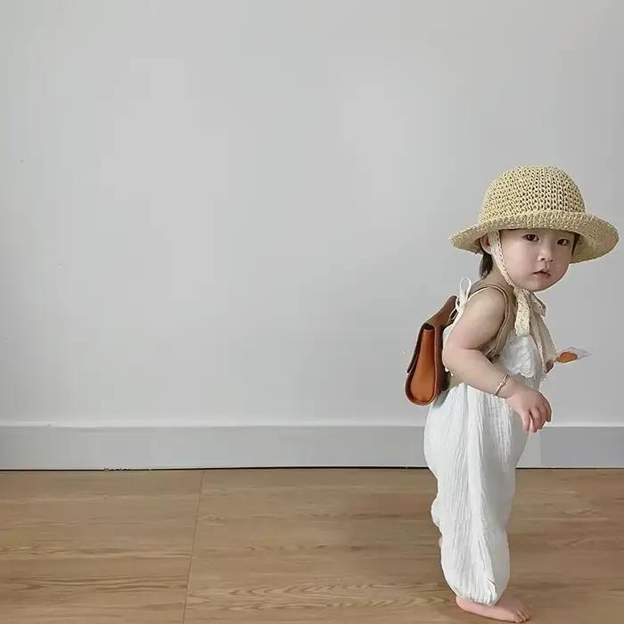 Chapeau en raphia tissé à la main pour enfants, printemps et été, dôme ajouré, bord roulé, cravate r