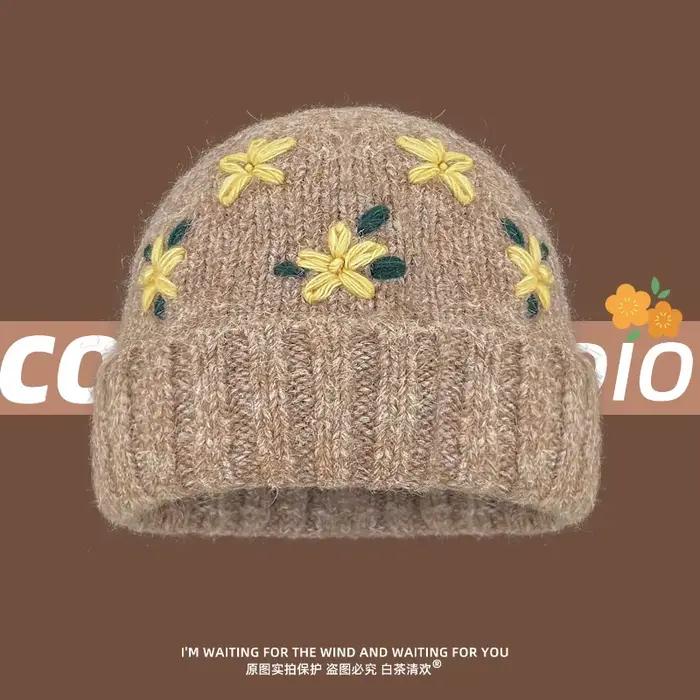 Niche coréenne crocheté à la main fleur tricoté chapeau automne et hiver doux et polyvalent chaud grande tête crâne bonnet casquettes pour les femmes