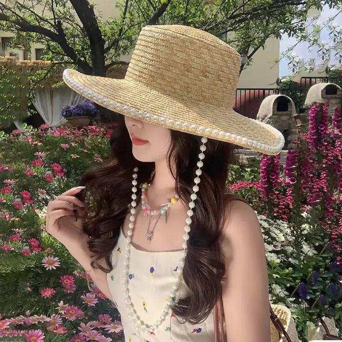 Chapeau de soleil français à large bord printemps-été 2026 avec chaîne de perles