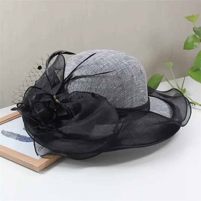 Chapeau de soleil fascinateur Sinamay à grand bord élégant avec fleur