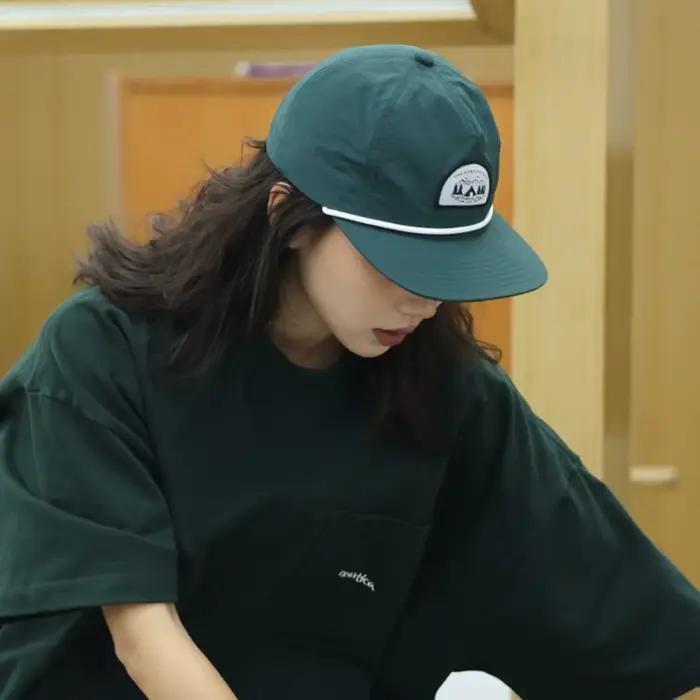 Casquette de baseball unisexe en nylon avec visière souple et design à bouton-pression pour passionnés de hip-hop occasions spéciales et activités extérieures