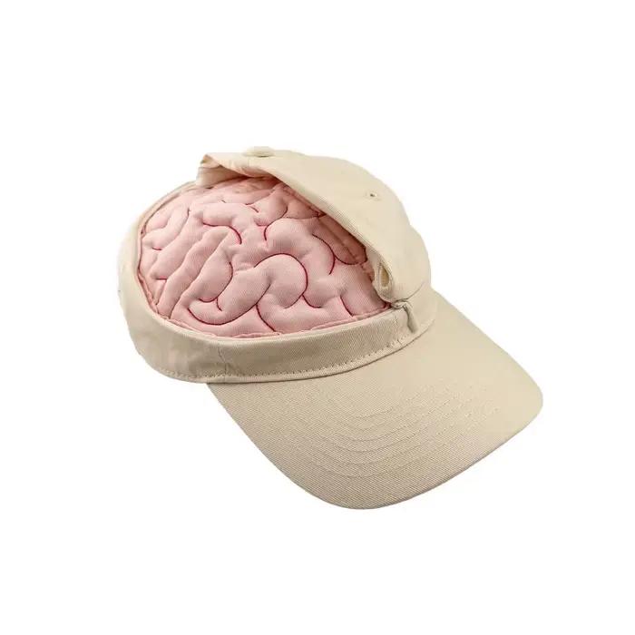 Le "bouchon cérébral" peut être ouvert et fermé. La casquette de baseball est mignonne et amusante. Il
