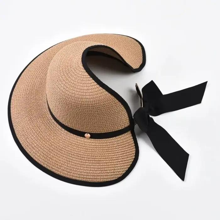 Chapeau de soleil élégant rond en paille pour l'été