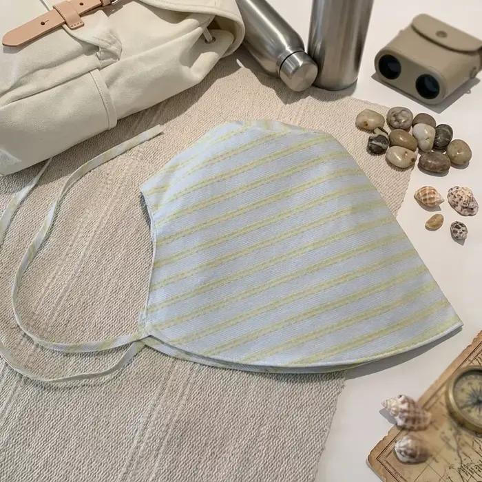 Chapeau de soleil à large bord rayé pour femmes protection UV léger et pliable pour les vacances plage voyages en plein air