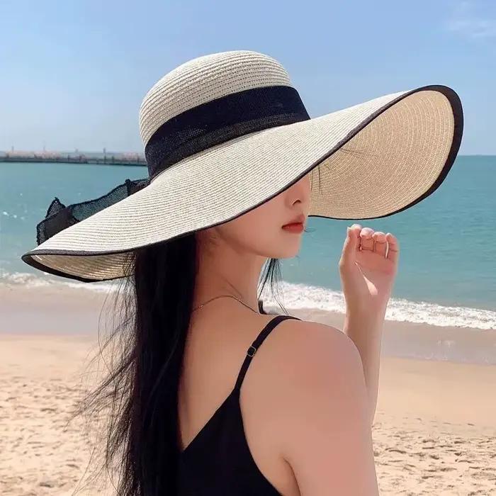 Chapeau de paille élégant à large bord pour femme