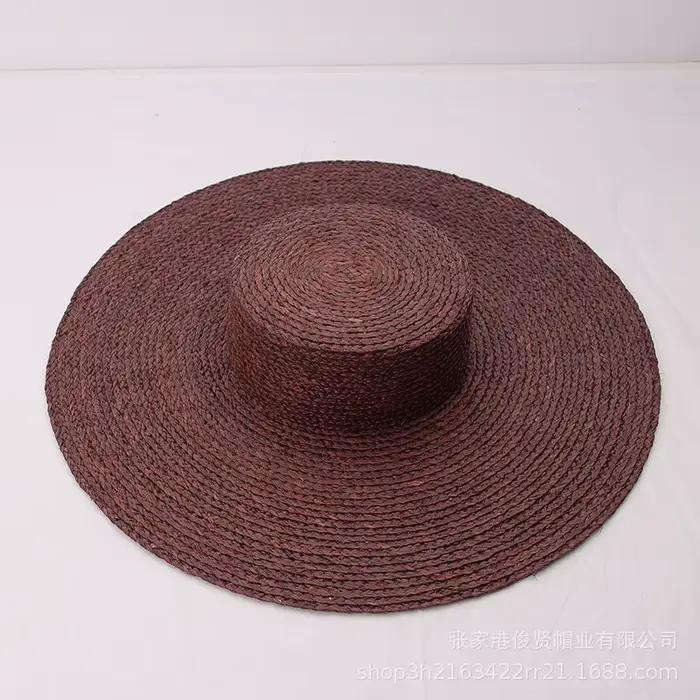 Chapeau plat en raphia marron café à grands bords pour femmes