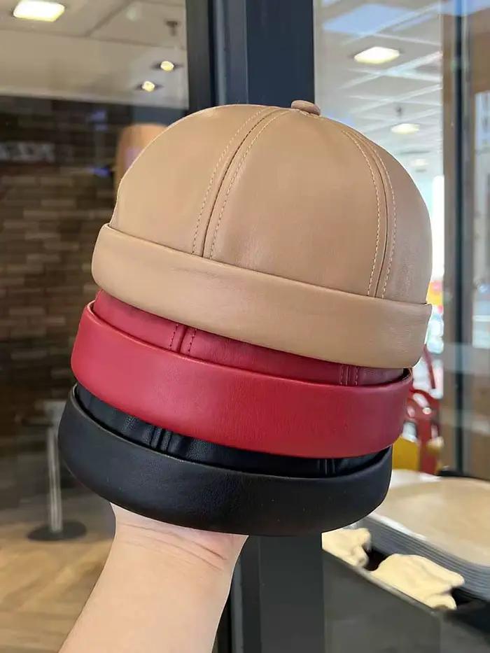 Chapeau de propriétaire en cuir vintage de printemps et d'été avec hip hop réglable