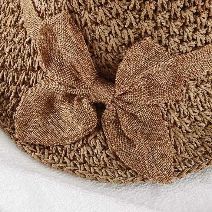 Chapeau Panama en paille fait à la main pour femmes avec détail de nœud papillon – Casquette solaire pliable à large bord protégée contre les UV pour la plage d'été