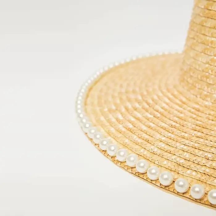 Chapeau de soleil français à large bord printemps-été 2026 avec chaîne de perles