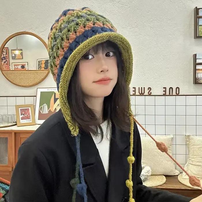1 chapeau en laine à bord bouclé pour femmes