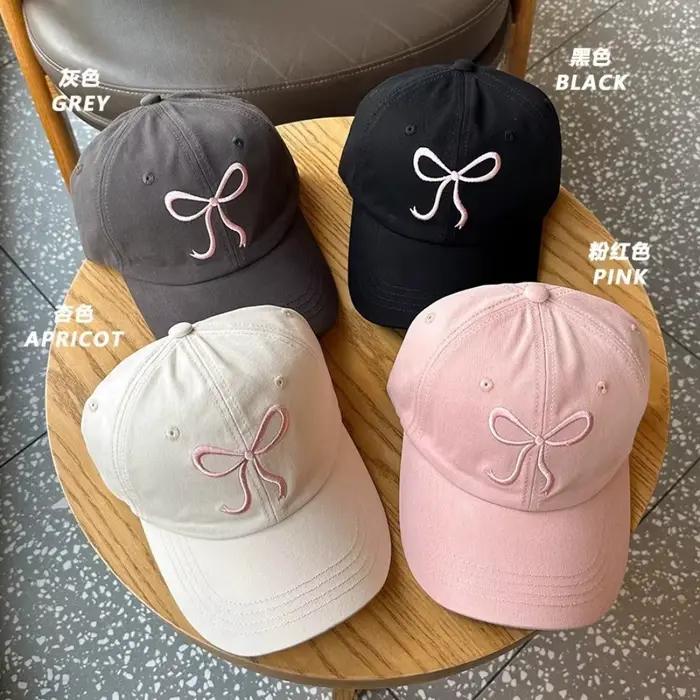 Casquette de baseball rose avec nœud pour femmes protection solaire extérieure style sport confortable voyage romantique