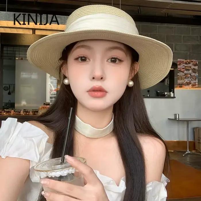 Chapeau de paille élégant de style français à dessus plat pour femme