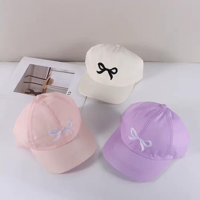 Casquette de baseball brodée avec un nœud ​ ​ Protection UV ​ ​ Sangle réglable ​ ​ ​ ​