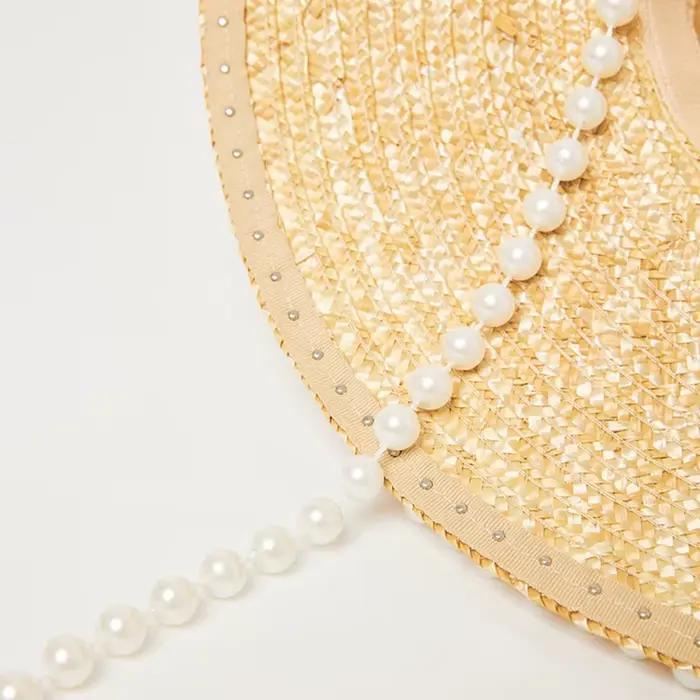 Chapeau de soleil français à large bord printemps-été 2026 avec chaîne de perles