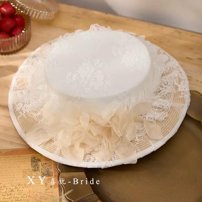 Chapeau de mariage élégant en dentelle