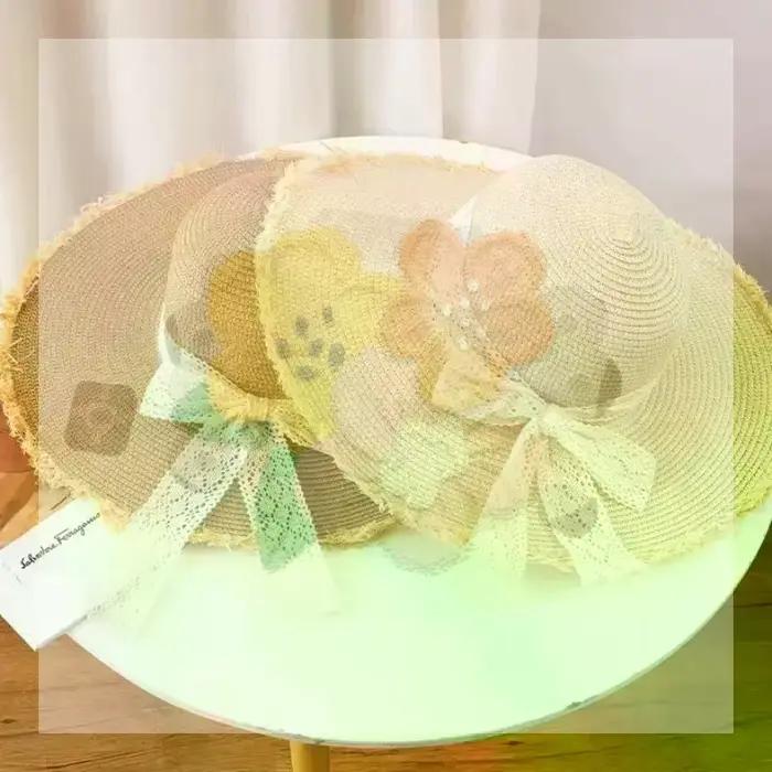 Chapeau de paille oversize à grand bord avec nœud décoratif pour femme
