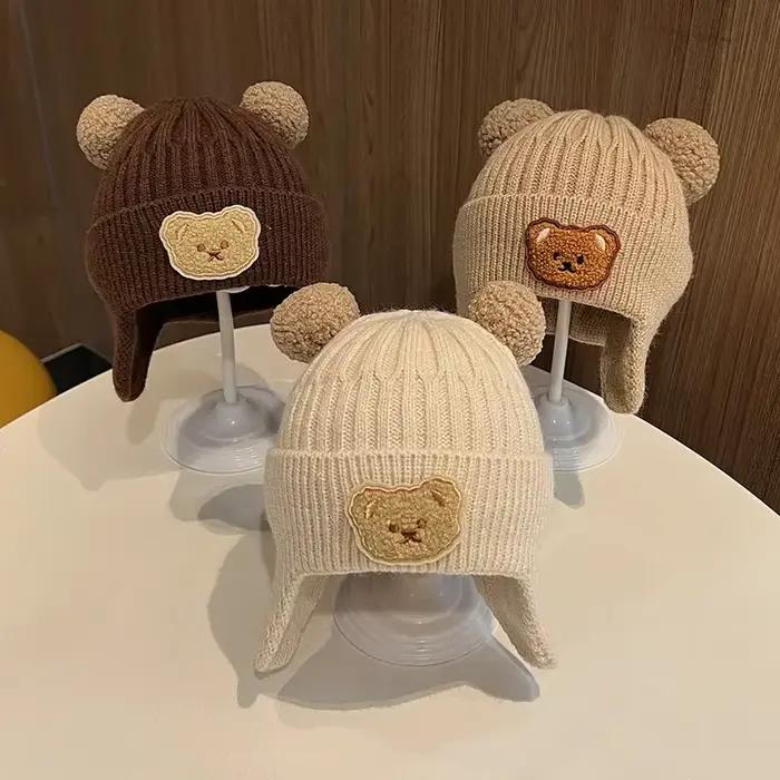 Chapeau de protection des oreilles d'ours en laine pour bébé