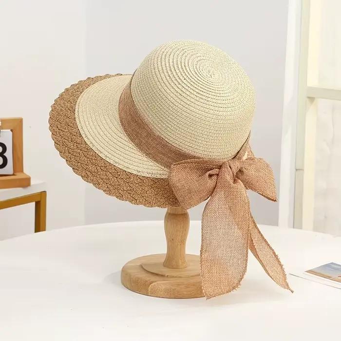 Grand chapeau de paille à nœud en dentelle