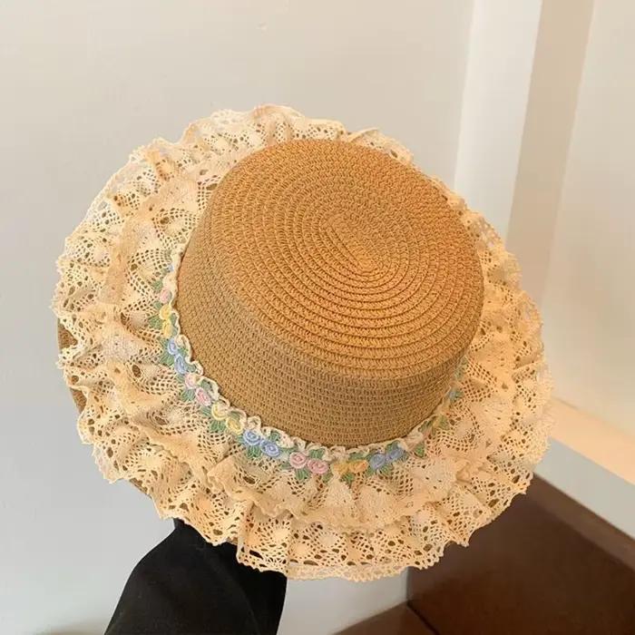 Chapeau de soleil Lolita doux en paille tressée à large bord et dessus plat