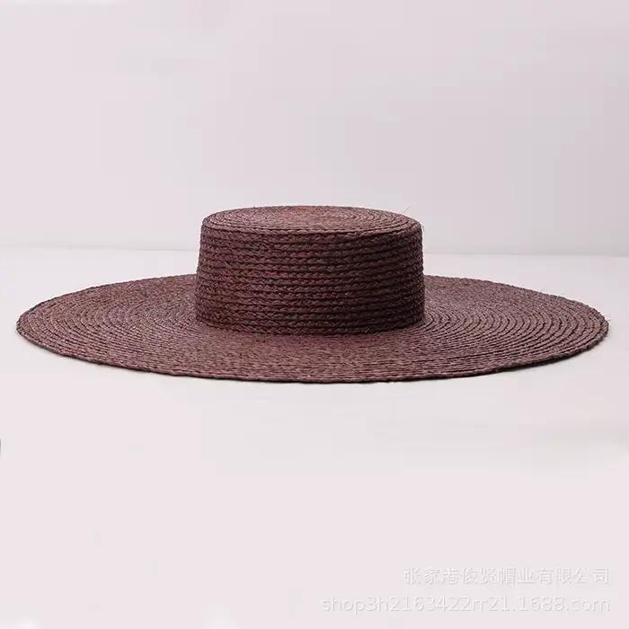 Chapeau plat en raphia marron café à grands bords pour femmes
