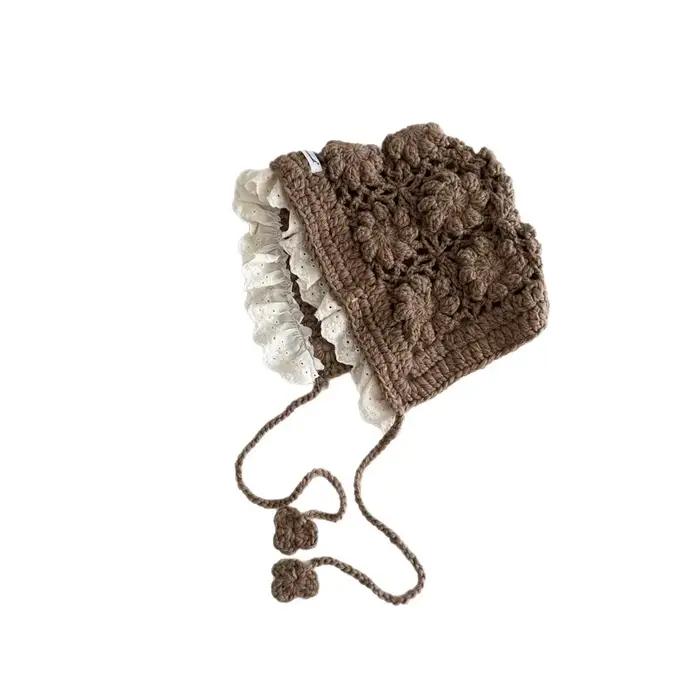 Bonnet tricoté jacquard ajouré à fleurs pour bébés et enfants