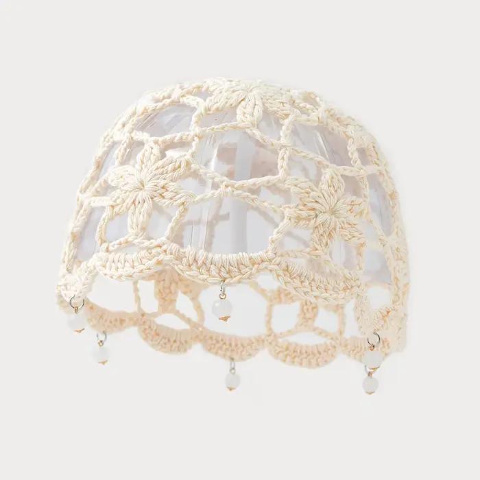 Chapeau en crochet ajouré pour femme