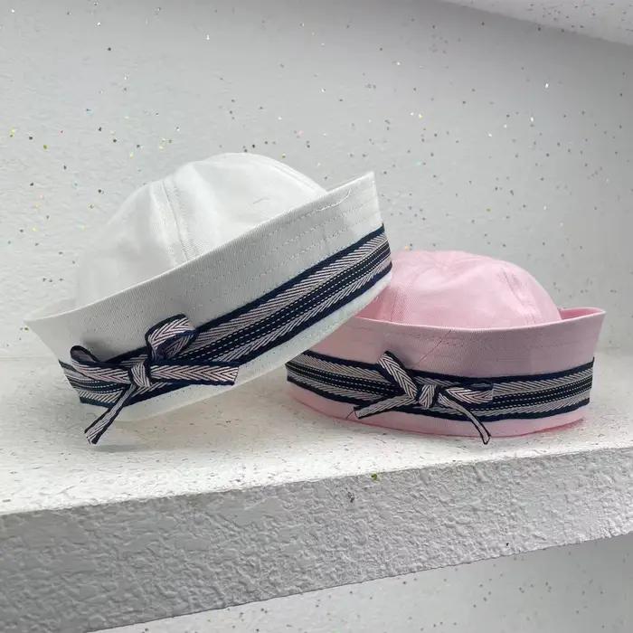 Chapeau de marin rose/blanc/noir pour la plage