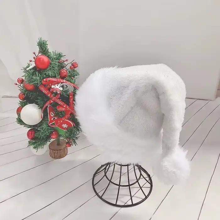 Chapeau de noël en peluche blanche