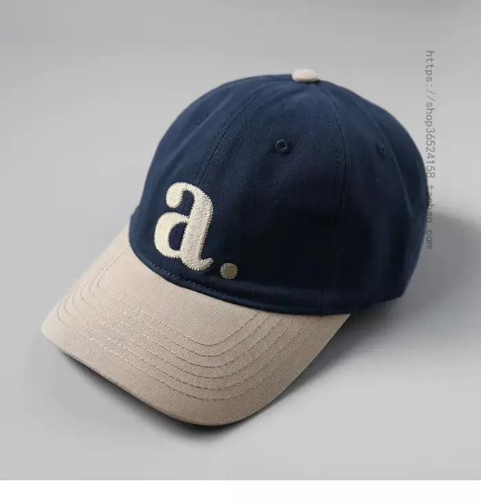 Style Simple contraste couleur casquette à visière douce femmes couture américaine