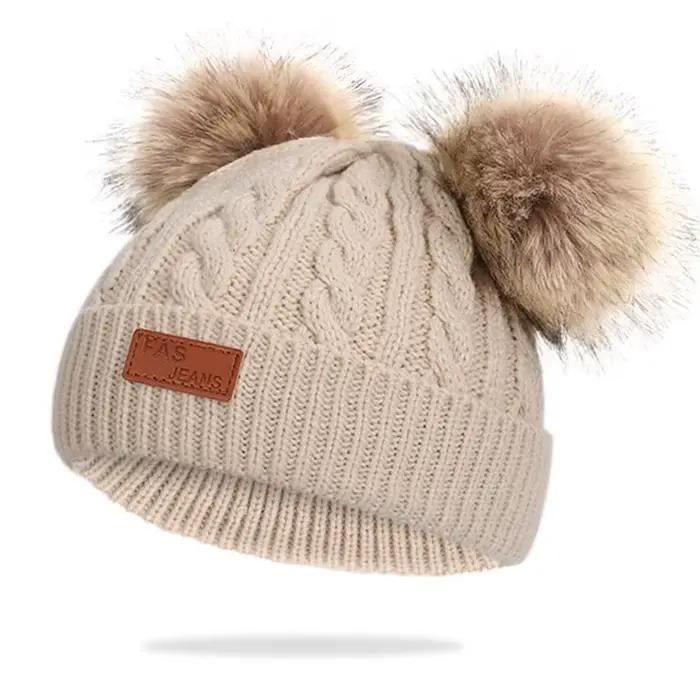 Bonnet double pompon en laine pour enfants