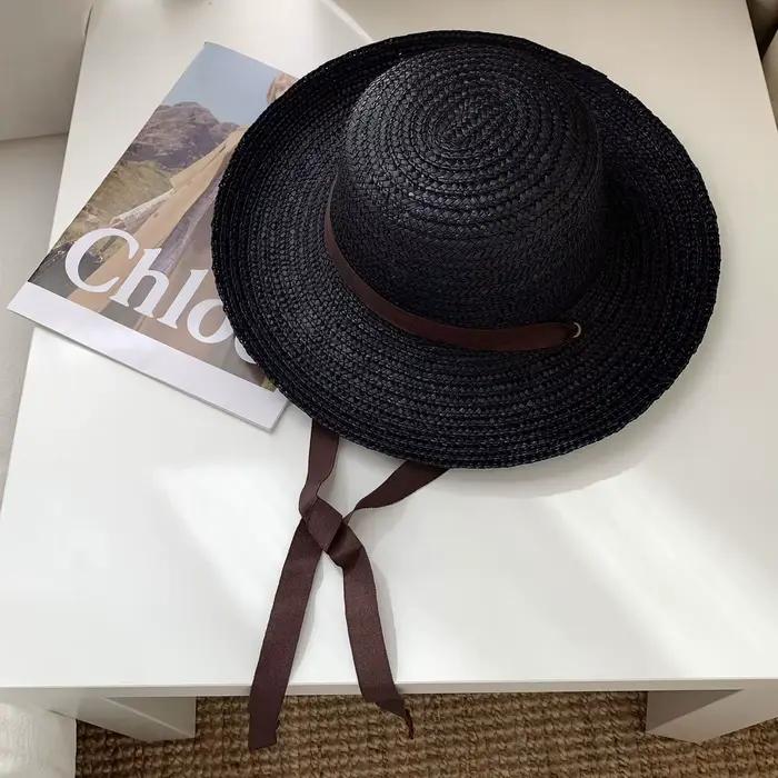 Chapeaux de paille élégants noirs à long ruban pour femmes