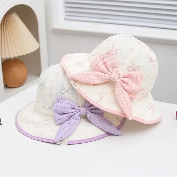 Chapeau de soleil kawaii pour enfants avec protection uv nœud papillon casquette à large bord pour garçons et filles occasions spéciales été vacances