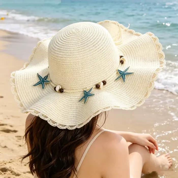 Chapeau de paille à large bord style bohème orné de coquillages