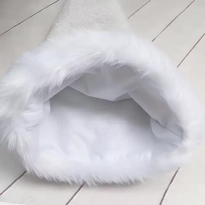 Chapeau de noël en peluche blanche