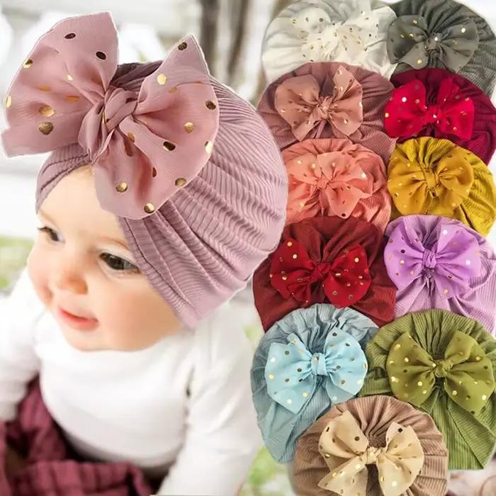Joli chapeau à nœud papillon brillant pour bébé