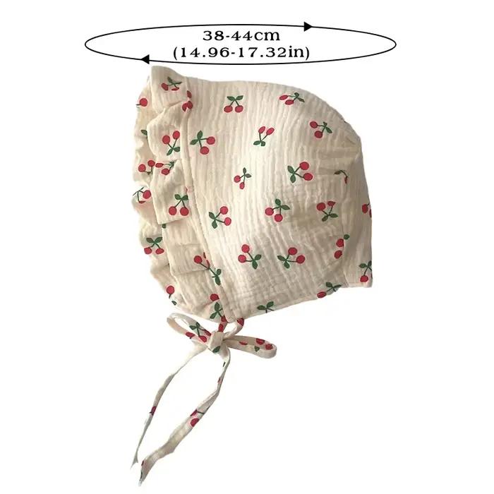 Bonnet floral mignon à volants pour nouveau-né
