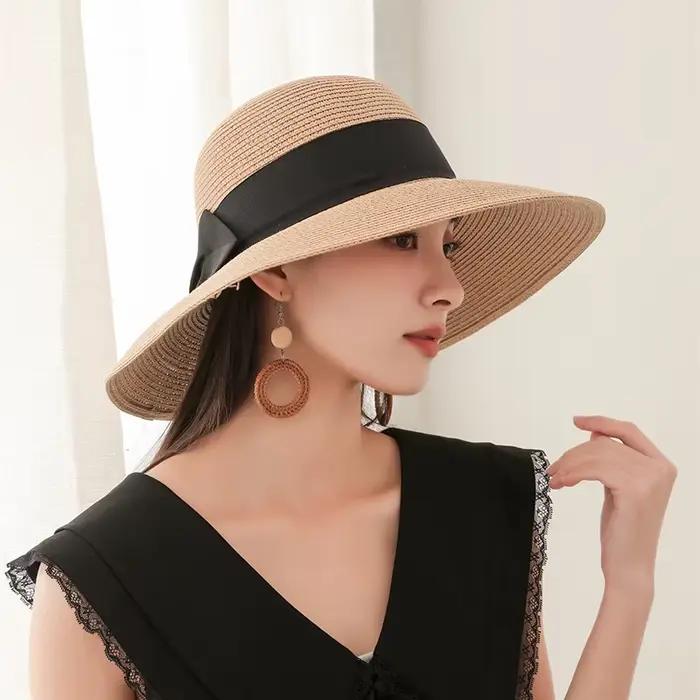 Chapeau de paille grand avant-toit avec nœud papillon noir pour femmes protection solaire et élégance mode été plage vacancesextérieuractivitéschic