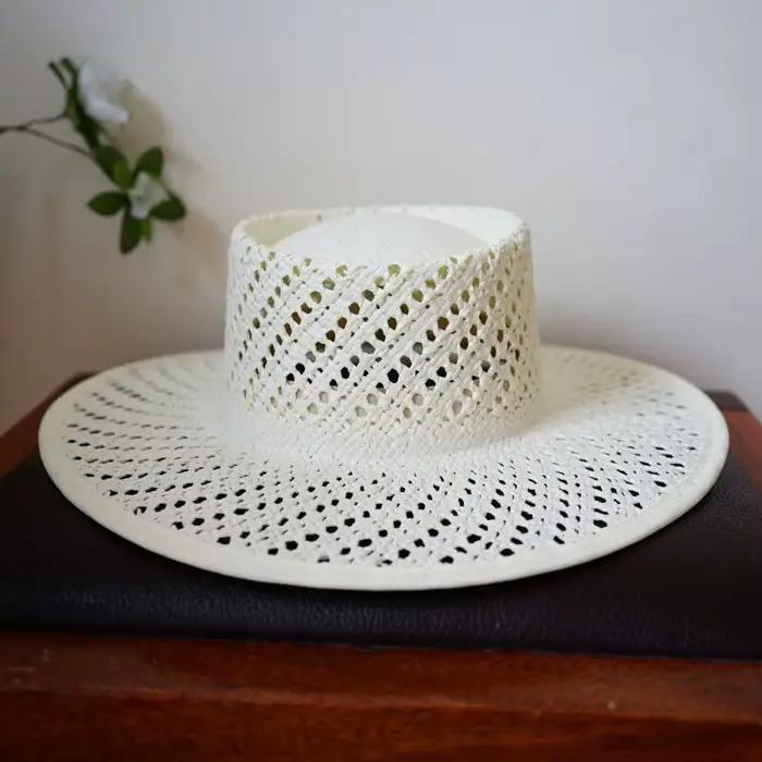 Chapeaux de paille de plage creux à grand bord pour femmes