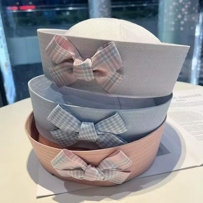 Chapeau de marin rose/blanc/bleu pour la plage