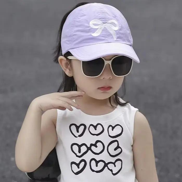 Casquette de baseball brodée avec un nœud Conception de queue vide Sangle réglable Chapeau de soleil