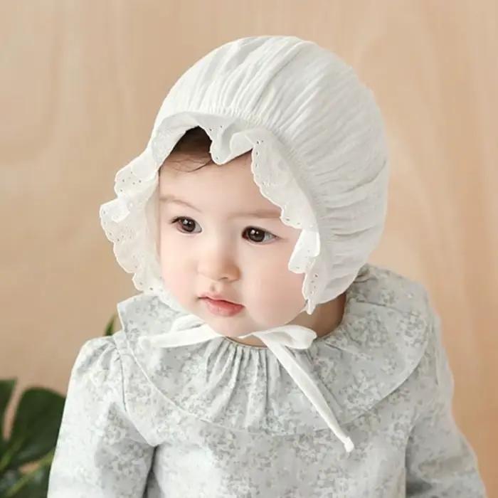 Casquette mignonne en polyester avec dessins animés pour bébés 0-1 ans protection auditive et toute saison