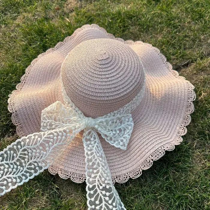 Chapeau de soleil à large bord pour femme avec nœud décoratif