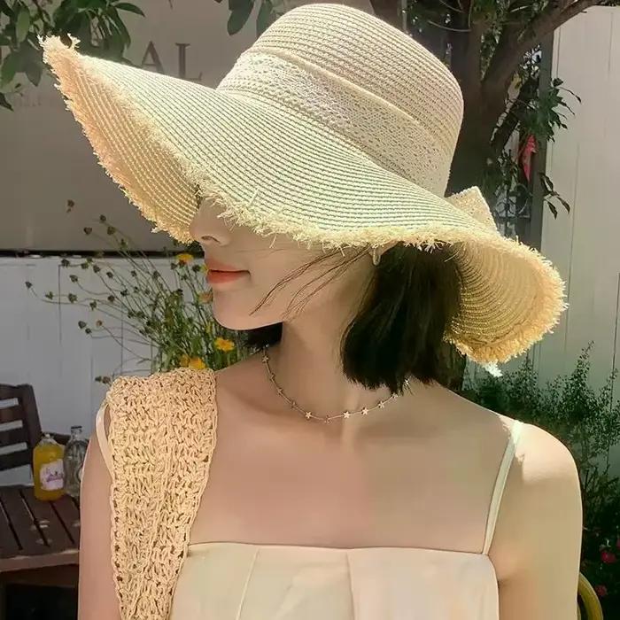 Chapeau de plage en paille surdimensionné pour femme avec nœud