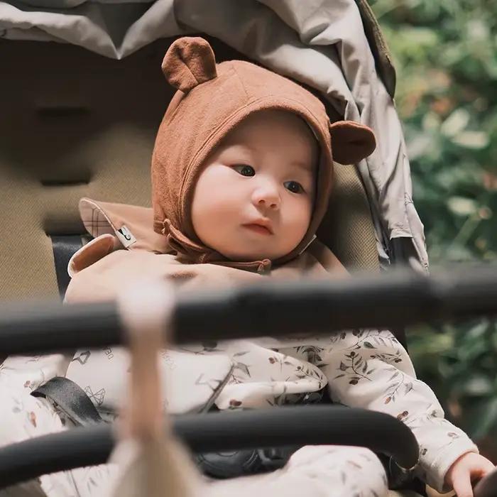 Chapeau à rabat d'oreille pour bébé ours