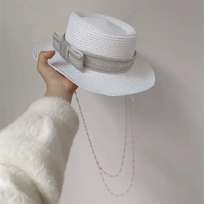Chapeau seau en paille avec chaîne de perles