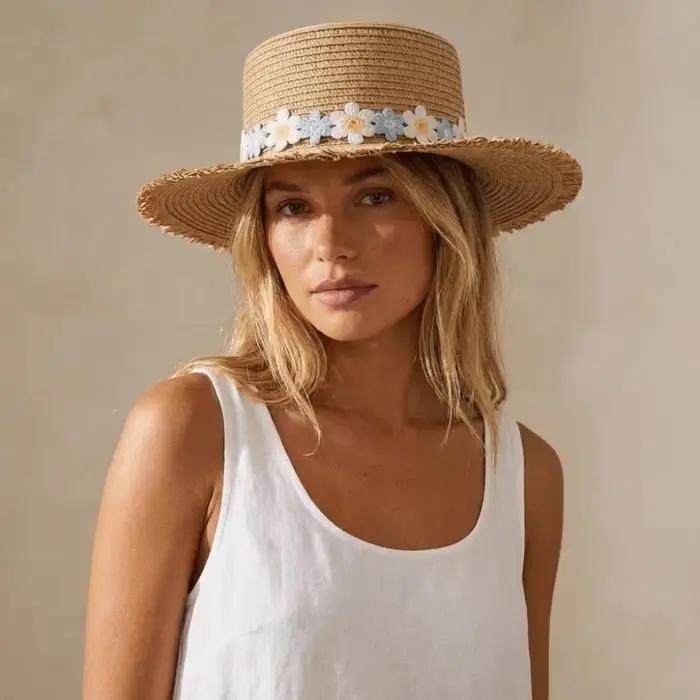 Chapeau de paille à large bord tendance avec fleur