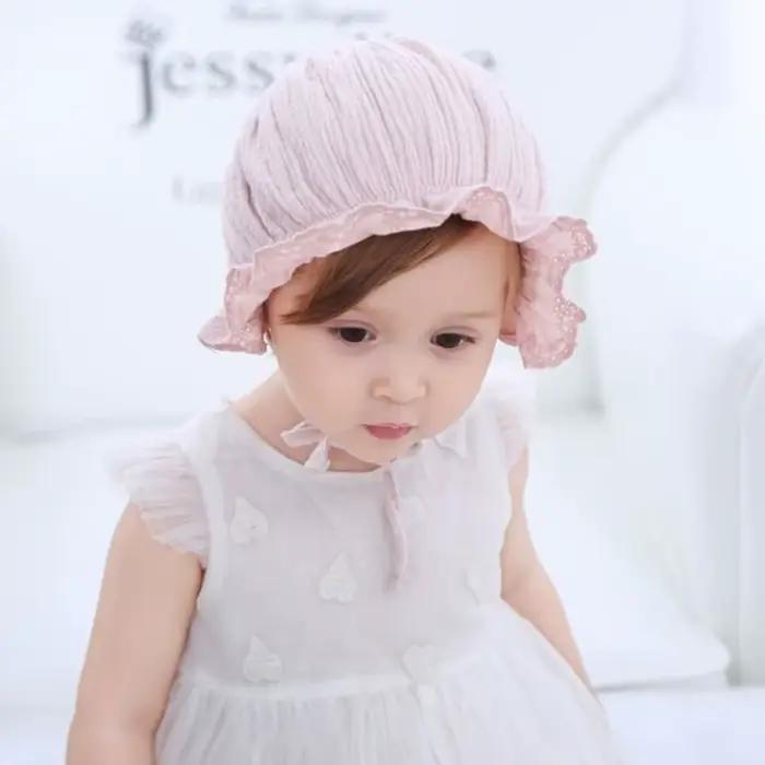 Casquette mignonne en polyester avec dessins animés pour bébés 0-1 ans protection auditive et toute saison