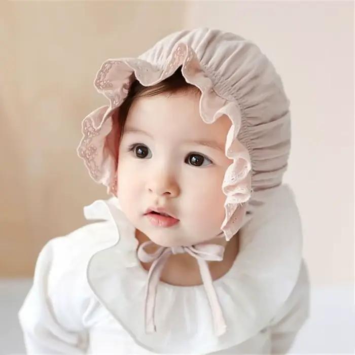 Casquette mignonne en polyester avec dessins animés pour bébés 0-1 ans protection auditive et toute saison